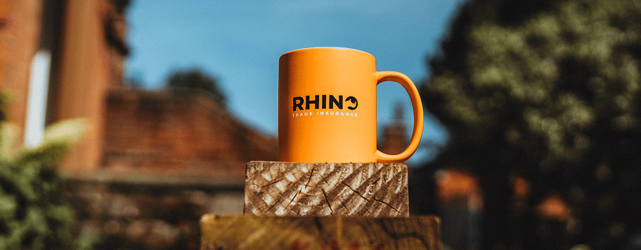 Rhino mug sitting on top of timber on construction site