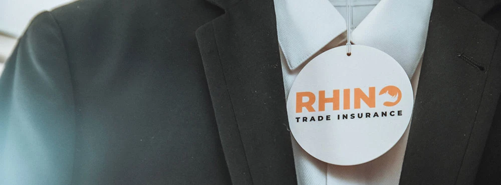 Suit with Rhino Trade Insurance tag